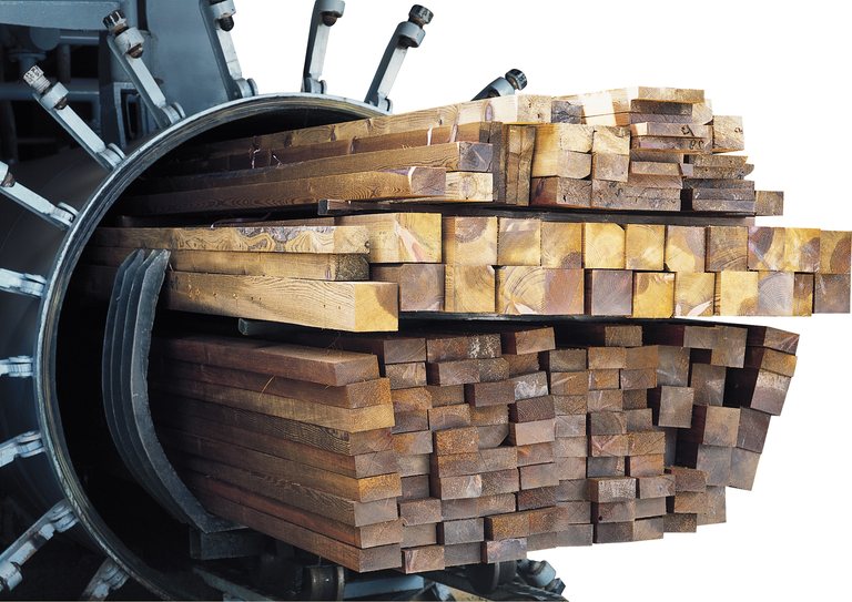 Timber loaded into the vacuum-pressure vessel